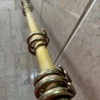 چوب پرده طلائی شیاردار برای پرده پانچ با۳۲عدد حلقه