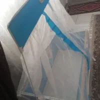 گهواره نوزاد کودک آبی
