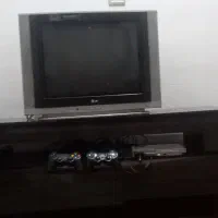 پلی ۲ همراه تلوزیون ۲۱ اینچ ال جی و میز تلوزیون