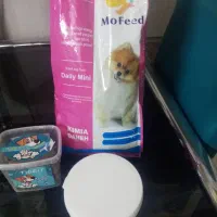 مقداری غذای توله سگ وشیر خشک