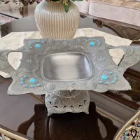 ظرف پیوتر پایه دار فیروزه کار شده