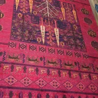 فرش قرمز لاکی طرح بلوچی