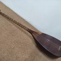 تنبور فرجی گهواره 16ساله مضراب‌خورده