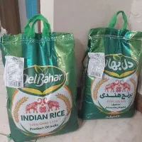 دو تا کیسه ۱۰ کیلویی برنج دل بهار دانه بلند 1718