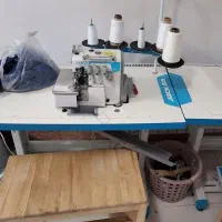 خیاط و دوزنده و اتوکار در کارگاه