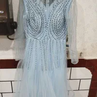 لباس مجلسی|لباس|شوش, |دیوار