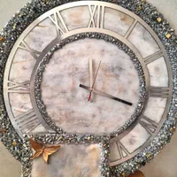 ساعت دیواری رزینی دور کریستالی طرح سنگ