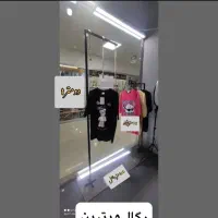دکور مغازه پوشاک ومیز مبلمان