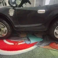 ماشین شارژی دونفره اسپرت/بسیار کم کار و تمیز|اسباب‌بازی بچه|تهران, تهرانپارس جنوبی|دیوار