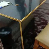 میز به همراه دو تا صندلی