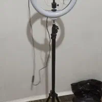 سه پایه دوربین و رینگ لایت