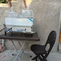 سلام یک عدد گاز دولگن دار ویک میز دوصندلی تاشو