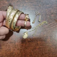 مقداری طلا مطابق عکس به وزن ۳۱.۳۰۰گرم قیمت تابلو