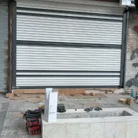 نصب و تعمیر کرکره برقی شیشه سکوریت جک بازویی