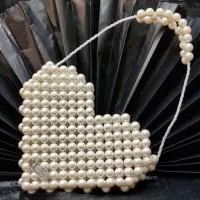 کیف مرواریدی یلدایی|کیف، کفش، کمربند|نیشابور, بزرگمهر|دیوار