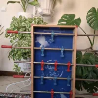 فوتبال دستی با میله های فلزی