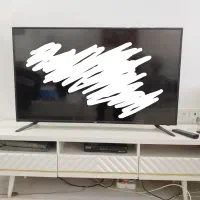 تلویزیون ۴۹ اینچ همراه با میز