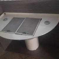 هود آشپزخانه طرح شومینه به همراه ام دی اف دور آن