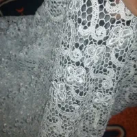 چند قواره پارچه لباسی زنانه و مردانه