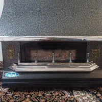 بخاری گازی طرح شومینه