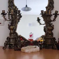 یک عدد آینه و شمعدان  تمام برنج