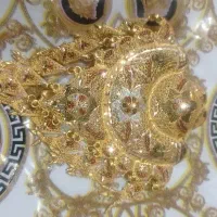 سنجاق طلا اصلا استفاده نشده و یک النگو بچه گانه