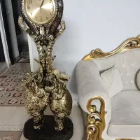 ساعت ایستاده طلایی