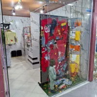 پوشاک بچه گانه|کفش و لباس بچه|شیراز, لب آب|دیوار