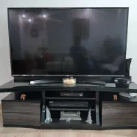 میز تلویزیون طرح چوب همراه شیشه روش برند jutty