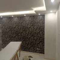 نصاب کاغذ دیواری و نقاشی ساختمان