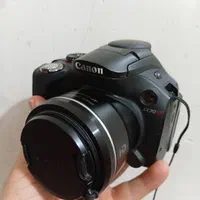 دوربین پاورشان اس ایکس ۳۰ و سه عدد سه پایه