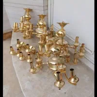 فروش وخریدار لوستر و آینه کنسول  ویترین برنجی