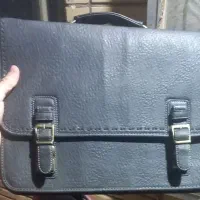 کیف چرمی اداری دارای ضربه گیر لبتاب و تبلت قفل دار