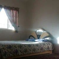 آپارتمان-دوخواب-همکف-با-حیاط-اختصاصی