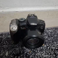 دوربین Canon + کیف و لوازم جانبی