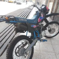 دی تی|موتورسیکلت|قم, قلعه کامکار|دیوار