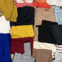 تعدادی لباس مردانه، تیشرت، شلوار، پیراهن