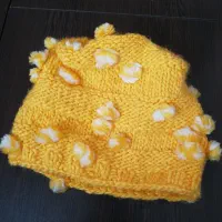 کلاه و لباس نوزادی