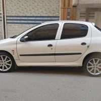 پژو۲۰۶ تیوفایو با لوازم سیستم صوتی رینگ و لاستیک