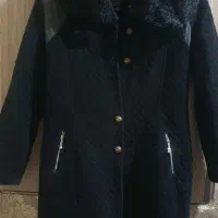 چند عدد پالتو و لباس پاییزی و کاپشن بچگانه