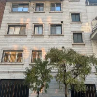 ملک بازسازی شده با چهار سند مجزا وحیاط مشجر