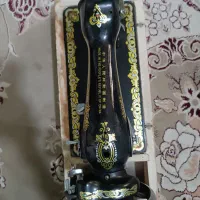 چرخ خیاطی آدم پرنده و مارشال