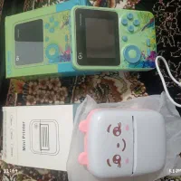 پرینتر حرارتی و کنسول بازی دستی