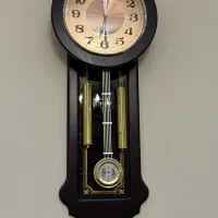 ساعت دیواری دور چوب