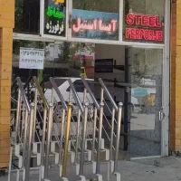 منشی مغازه نرده استیل