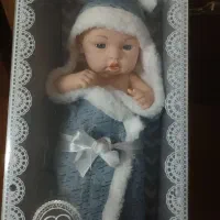 عروسک نوزاد  با حوله