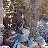 نیرو کار ساده در انبار ضایعات