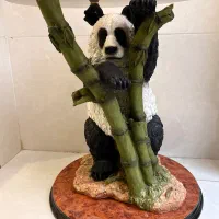 میز شیشه ای مجسمه دار