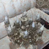 لوستر و کتیبه پرده