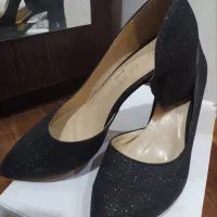 کیف و کفش مجلسی|کیف، کفش، کمربند|کاشان, کوشک صفی|دیوار